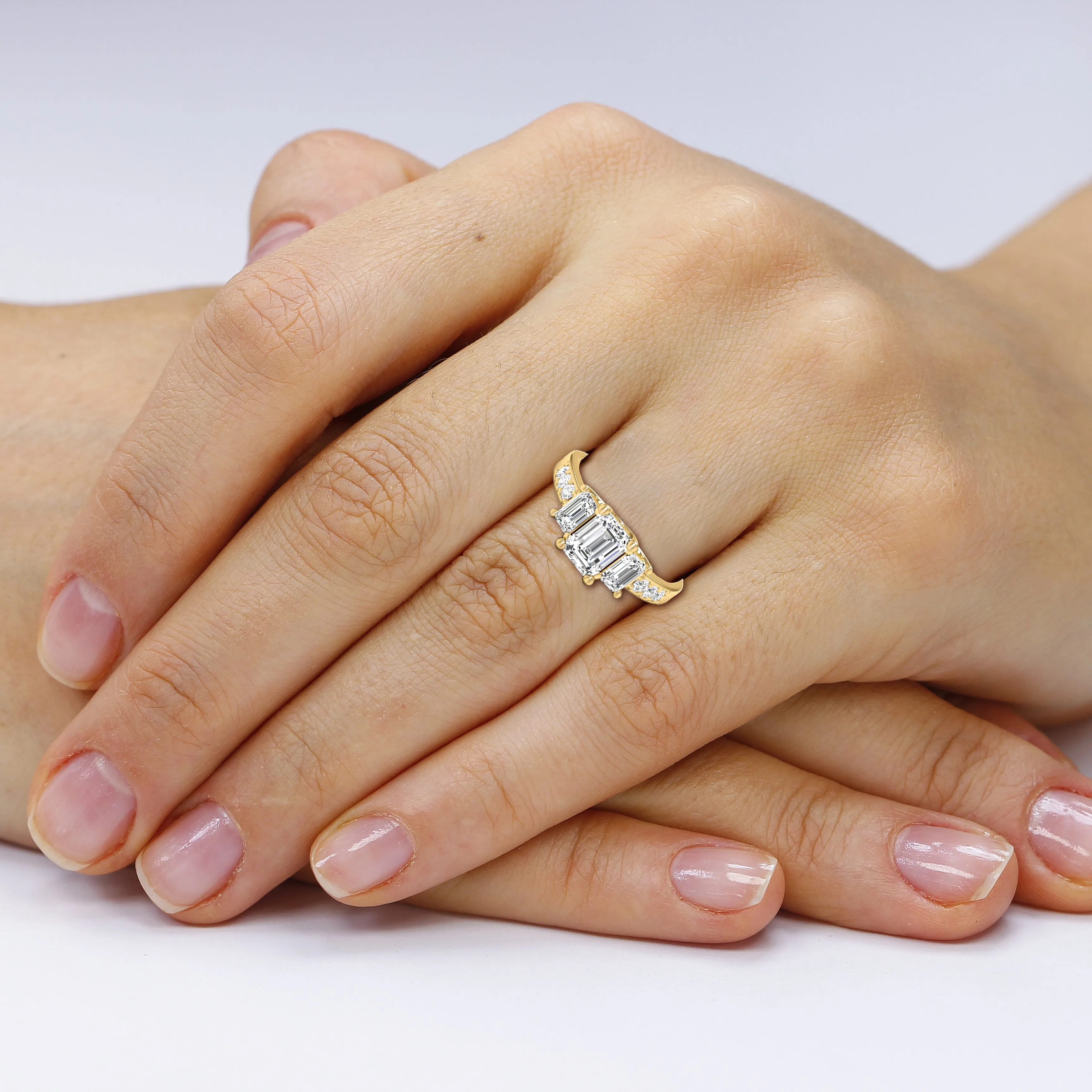 1.70-1.90 CT Round & Emerald Cut Diamonds - Three Stone Ring
