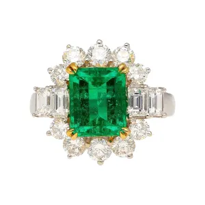4.42 Carat TW Colombian Emerald with Round & Emerald Cut Diamond Halo Ring