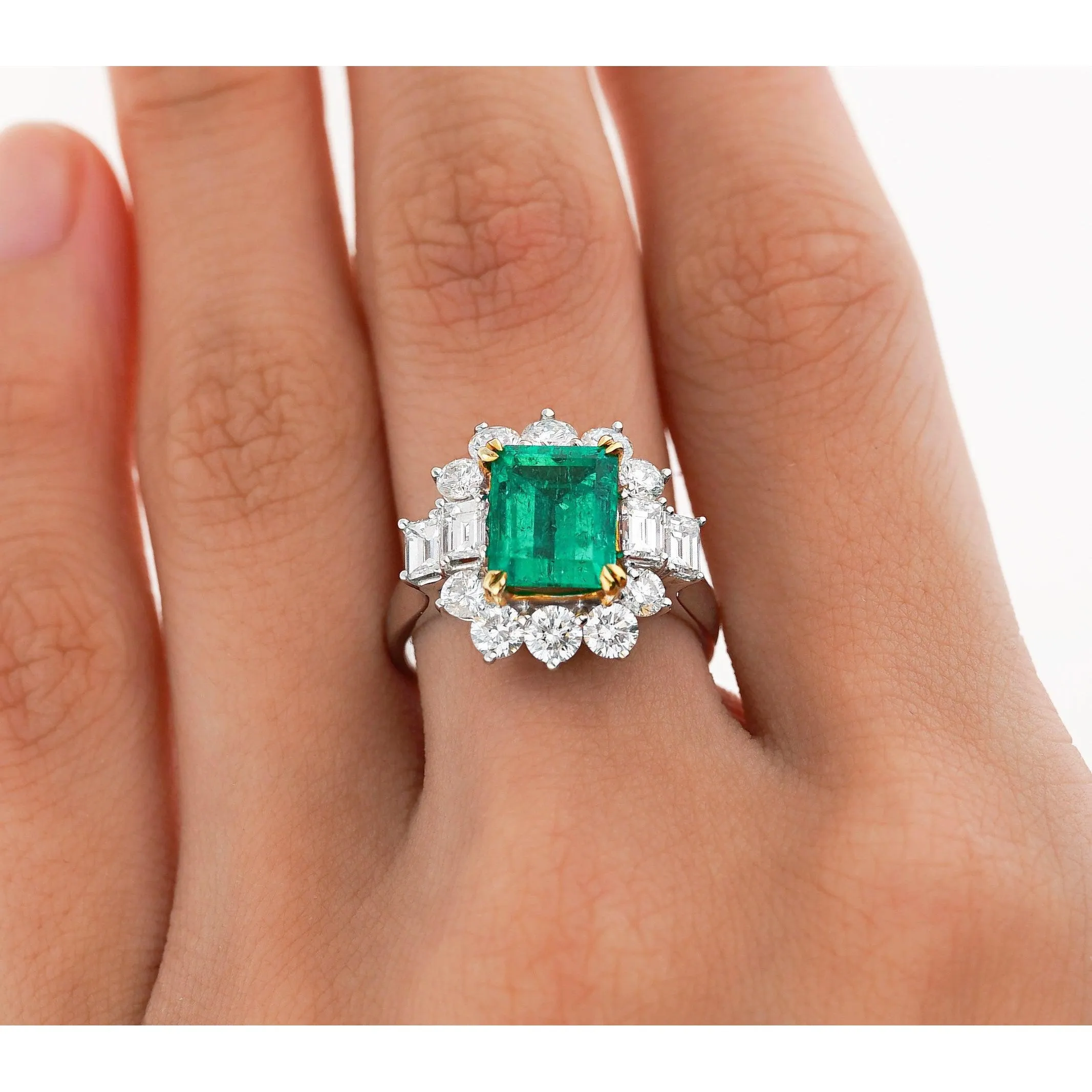 4.42 Carat TW Colombian Emerald with Round & Emerald Cut Diamond Halo Ring