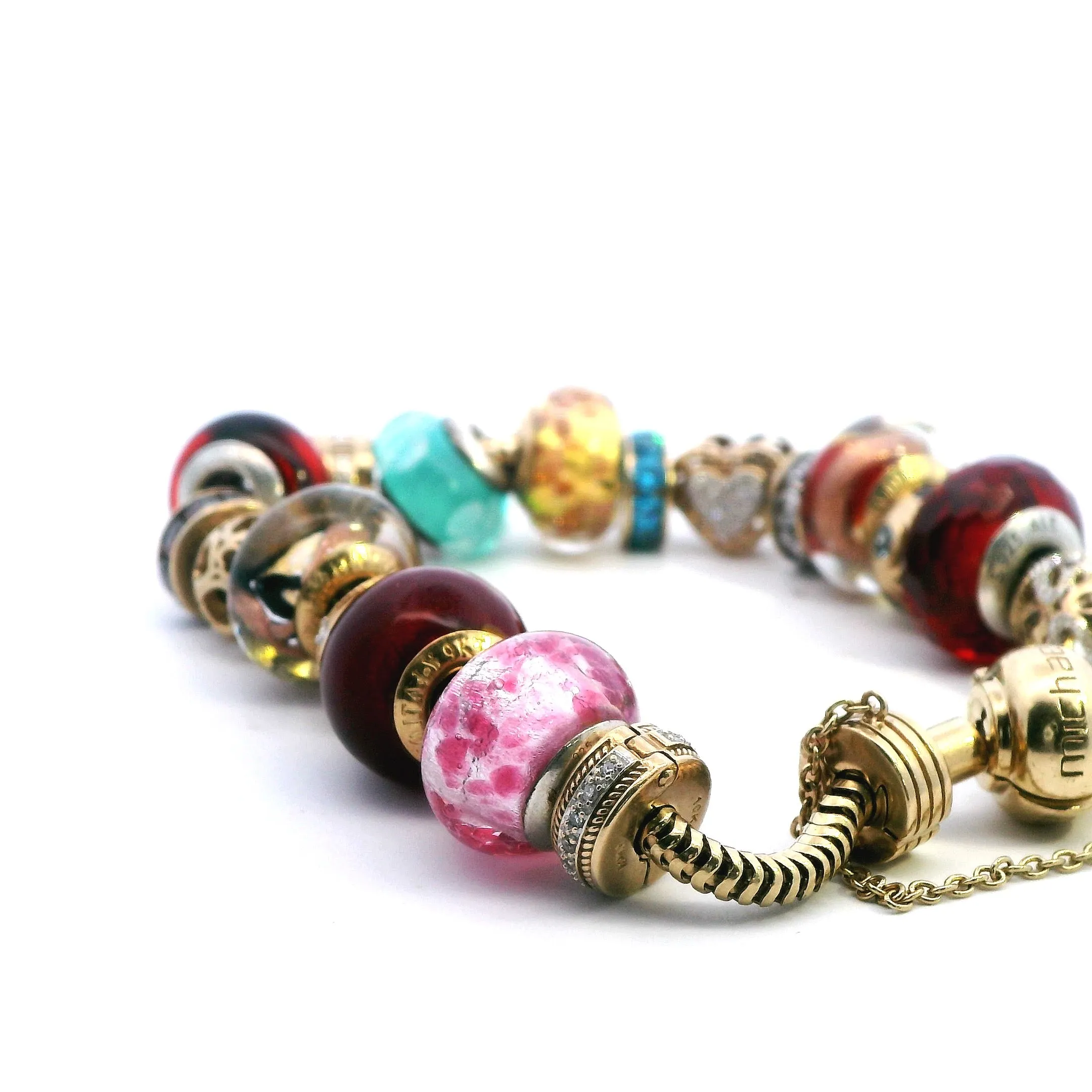 Luxurious 10k Yellow Gold Charm Bracelet with Exclusive Charms