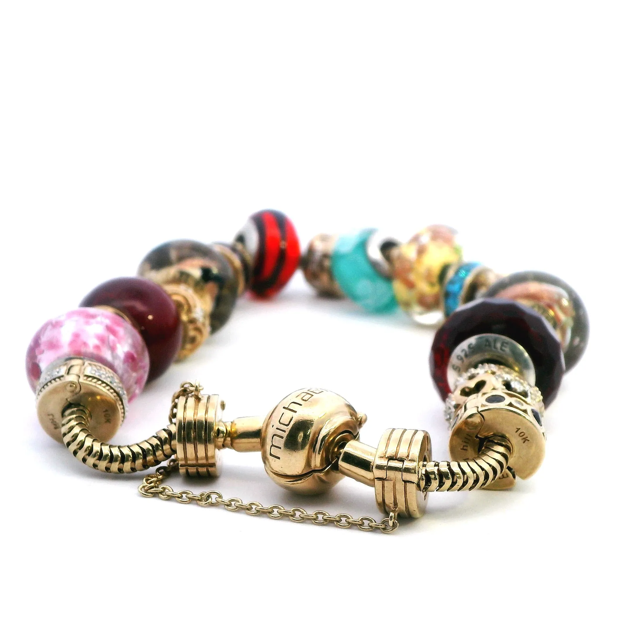 Luxurious 10k Yellow Gold Charm Bracelet with Exclusive Charms